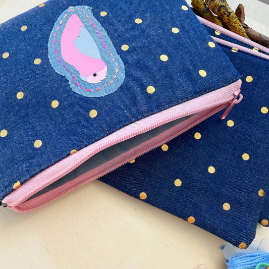 handmade blue denim pouch with gold polkadots featuring a galah applique and showing full lining