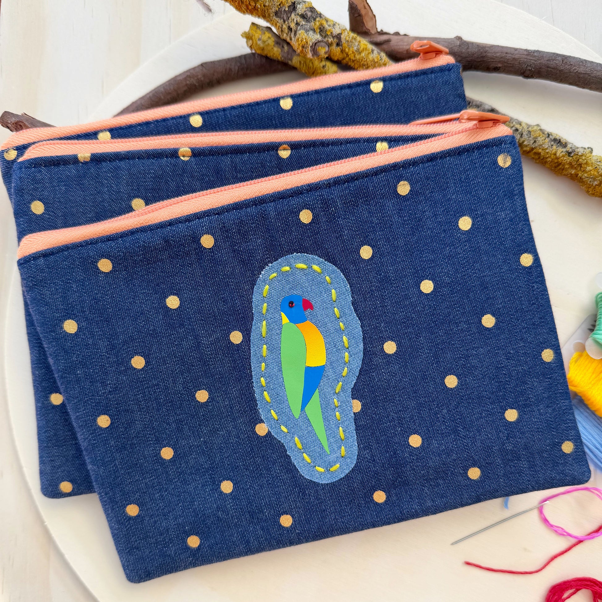 colourful handmade Australian Rainbow Lorikeet bird zip pouch featuring embroidered bird design by Lacroz & Co. Designs