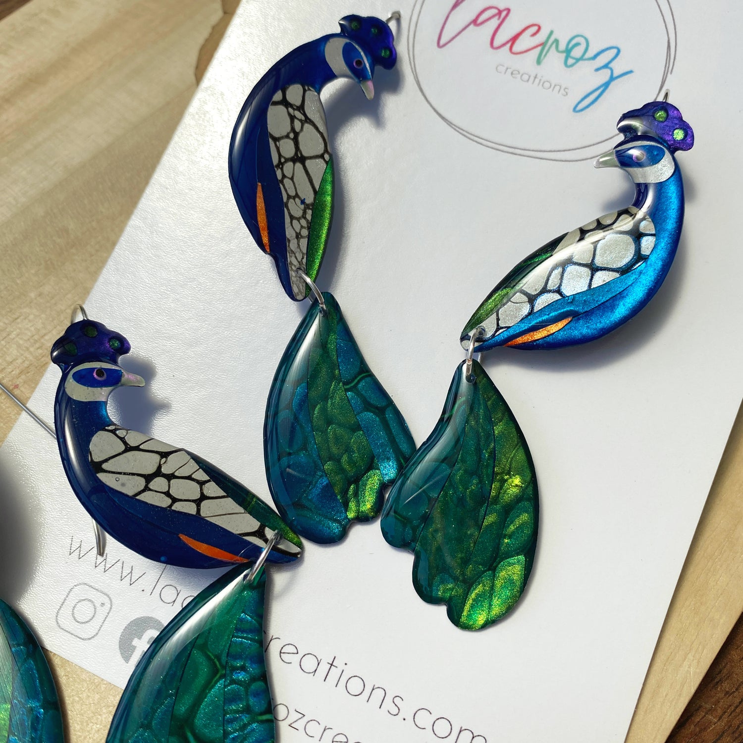 handmade resin coated peacock statement earrings