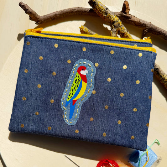 handmade zip pouch featuring eastern rosella bird design with handstitched details