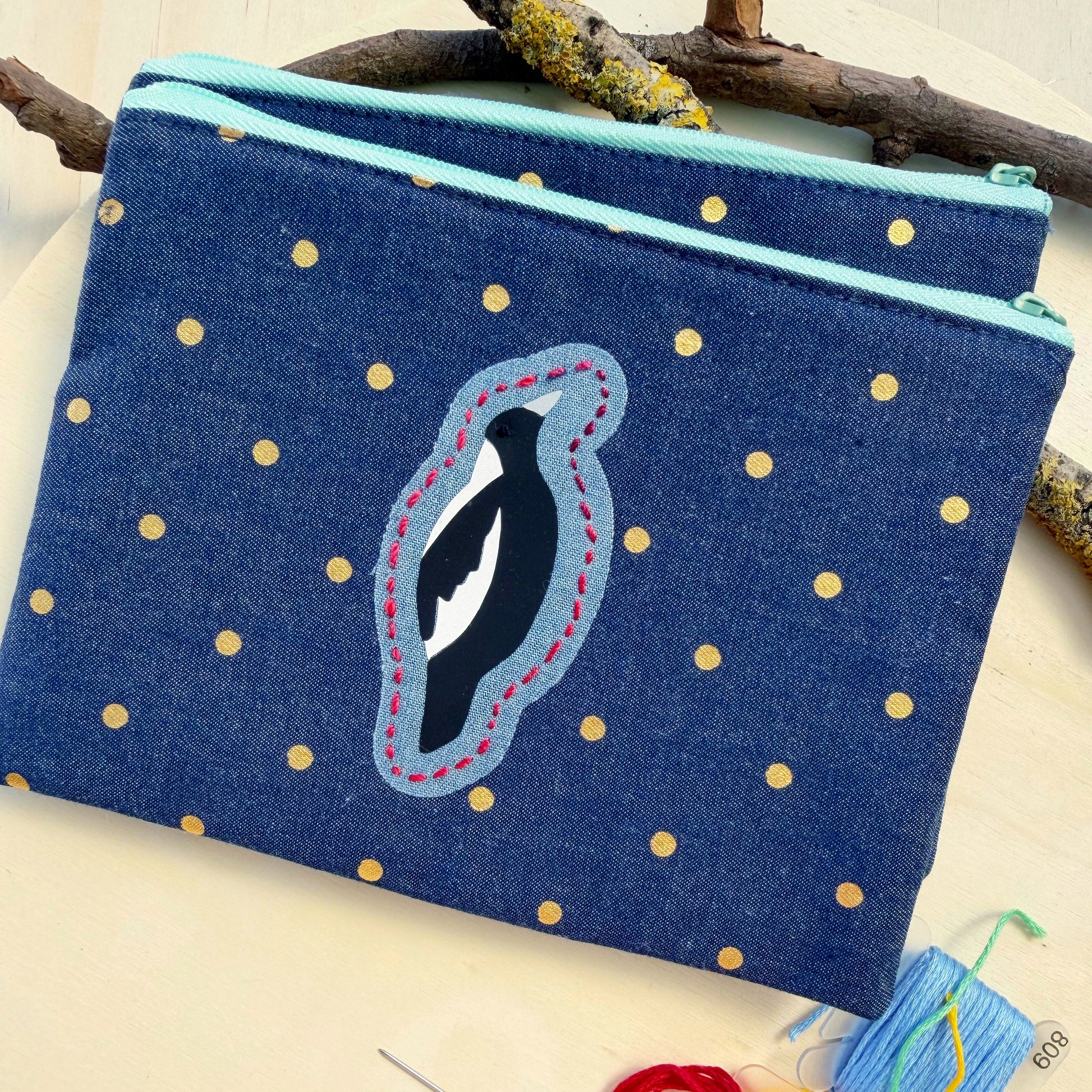 handmade pouch made from blue denim with gold polkadots featuring Australian Magpie bird design with handstitched details