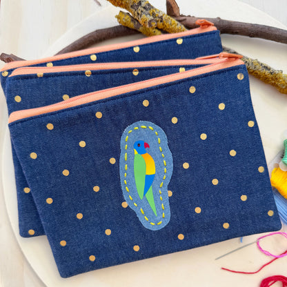 colourful handmade Australian Rainbow Lorikeet bird zip pouch featuring embroidered bird design by Lacroz & Co. Designs